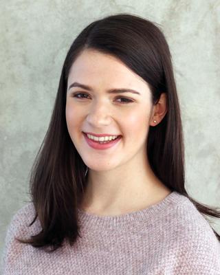 Headshot of Elizabeth Karron.
